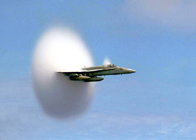An F/A-18 Hornet breaking the sound barrier.